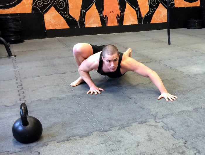 How to Enhance Your Whole-Body Strength Using Loaded Kettlebell Carries and The Spiderman Crawl