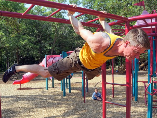 PCC Instructor Benji Williford Performs a Back Lever