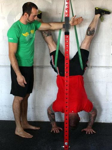 Chris Garay Training Client Assisted Handstand Push Ups