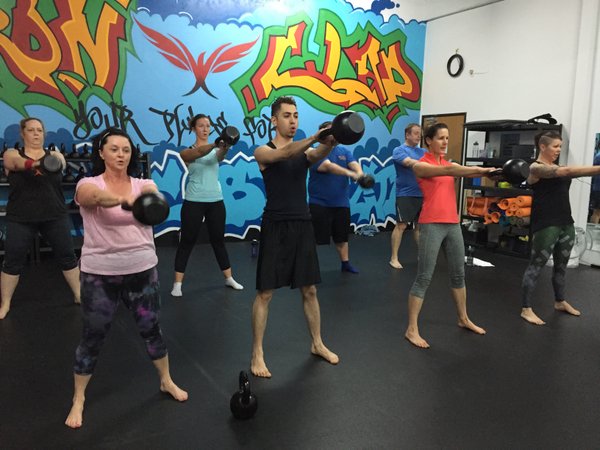 Iron Clad Fitness Group Class Kettlebell Swings