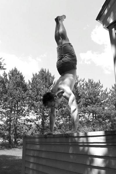 Nick Kenon Performs a Handstand