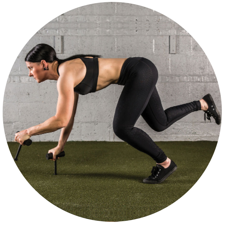 woman performing bear crawl exercise with Neuro-Grips push-up handles