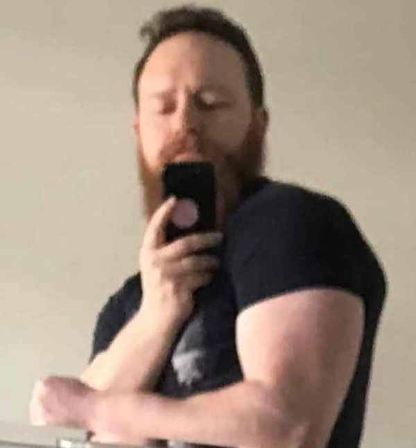 Paul McIlroy Arms Phone Photo in his 40s