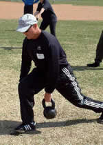 Mike Burgener, Notre Dame Football player, Champion weightlifter and head coach Junior Women's Weightlifting team practices with a Russian Kettlebell