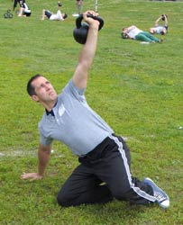 Kettlebell Success: Chiropractor Dr. Kevin Cooper demonstrates strength training exercises with Russian kettlebells