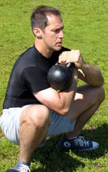 Kettlebell Success: Chiropractor Dr. Kevin Cooper demonstrates strength training routine with Russian kettlebells
