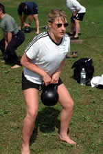 Kara Jones works out at the June 2003 Russian Kettlebell Challenge Workshop